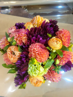 Arrangement with orange and red dahlia